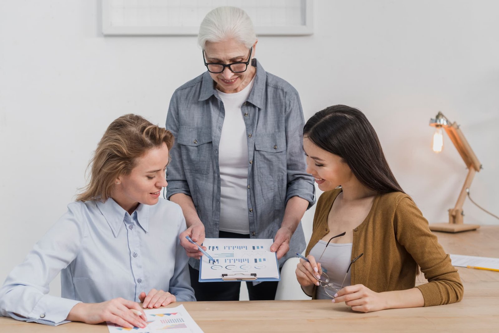 group-beautiful-women-planning-together (1)