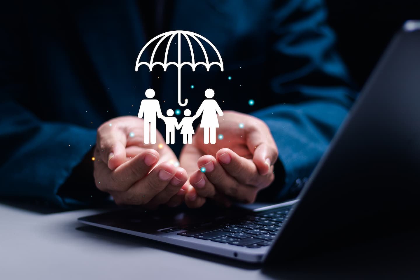 healthcare-life-insurance-concept-businessman-with-virtual-family-icon-protecting-family (1)